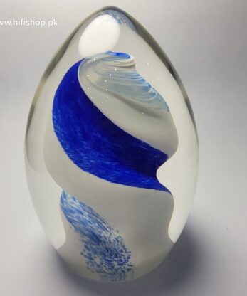 Glass ovoid paperweights often have captivating designs and inclusions, making each piece exceptional. The tranquil charm of blue and white inclusions could add a quiet, almost underwater feel to the piece, making it idyllic for display.