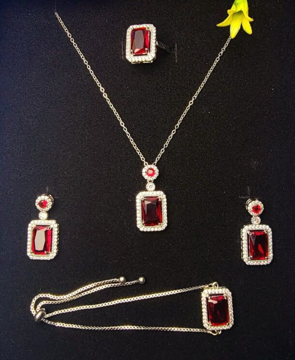 This elegant pendant set with earrings, rings, and bracelet is designed for women and girls for all occasions.